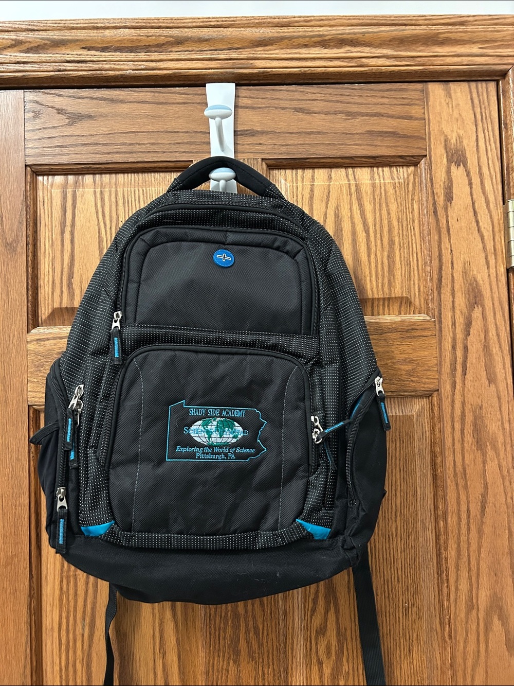 Black & Teal Multi-Pocket computer Backpack with multiple pockets for storage